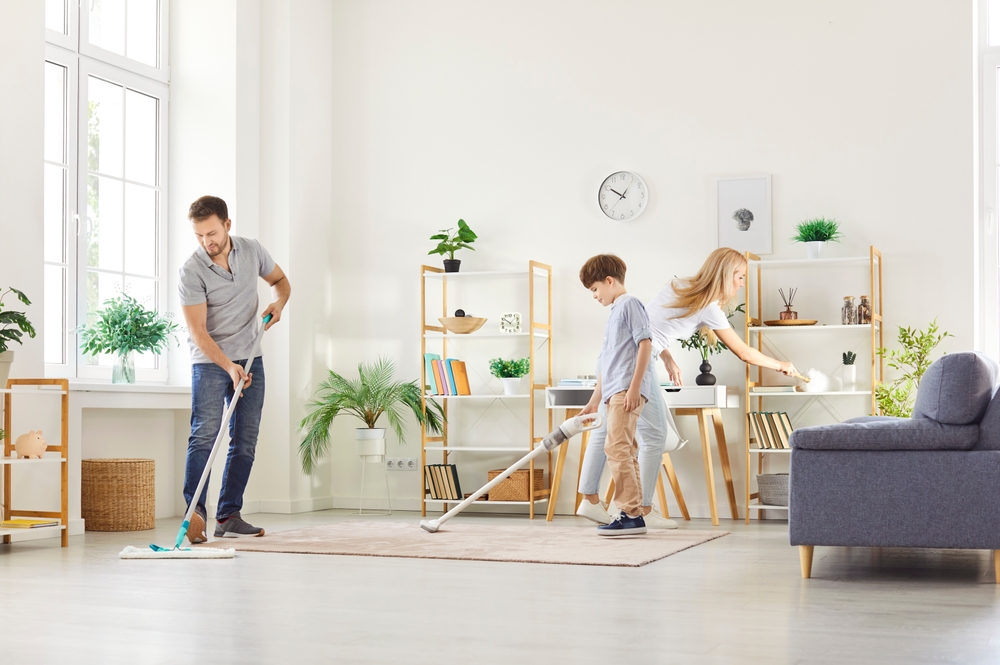 Happy,Cohesive,Family,Doing,Housework,Together,,Cleaning,Living,Room,,Involved