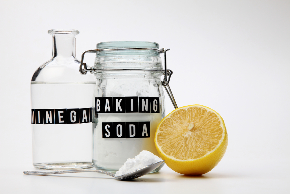 Baking,Soda,Vinegar,And,Lemon,On,The,White,Background