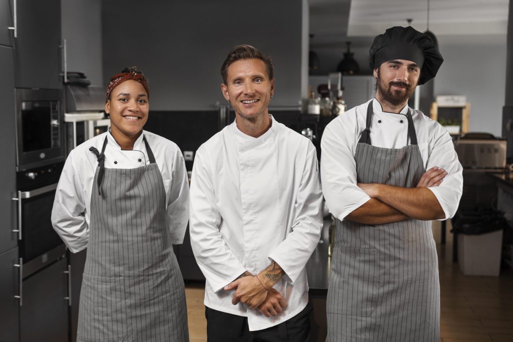 chef-working-together-professional-kitchen-min
