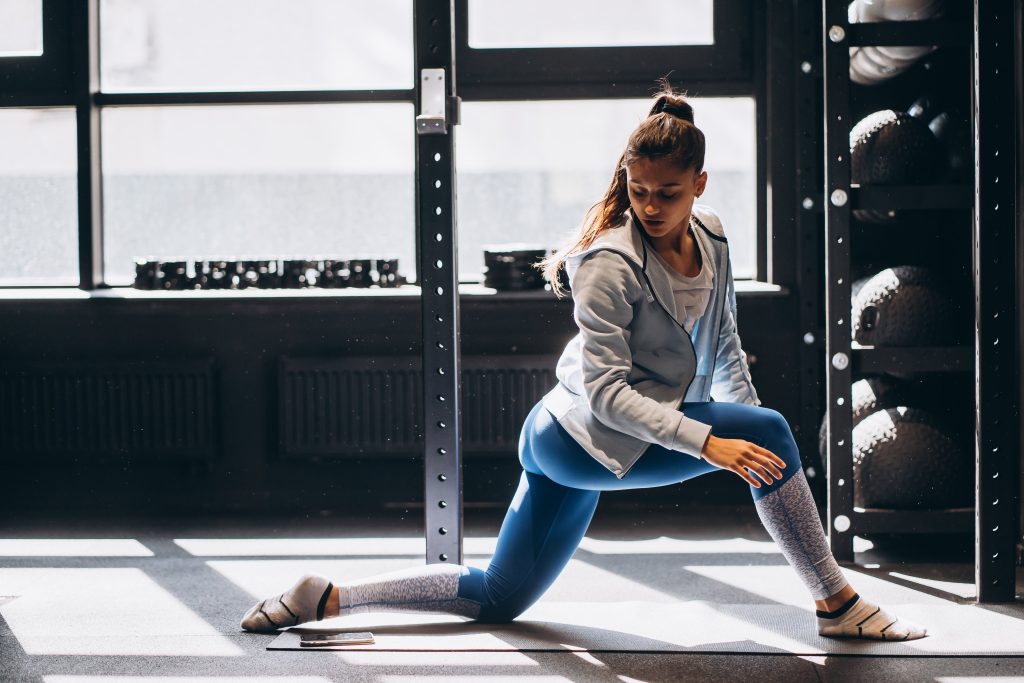 portrait-attractive-young-woman-doing-yoga-pilates-exercise-min